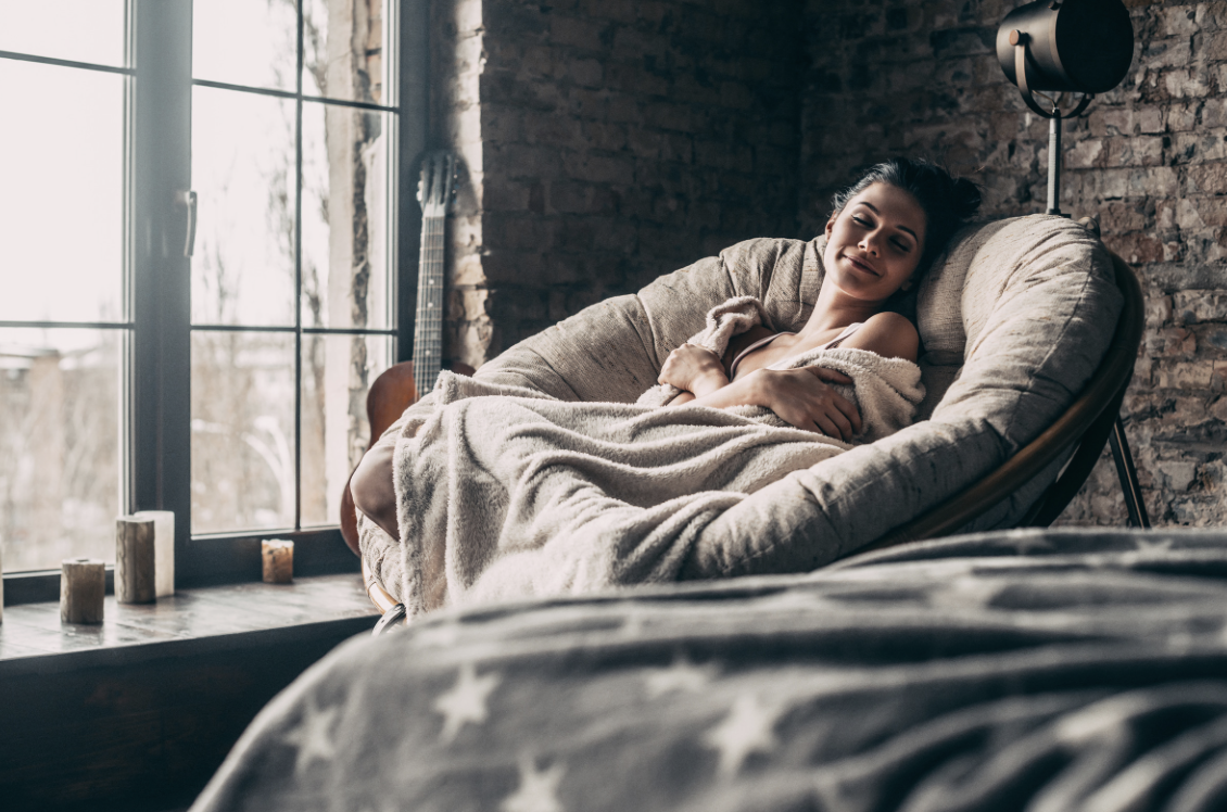Lady relaxing in a chair